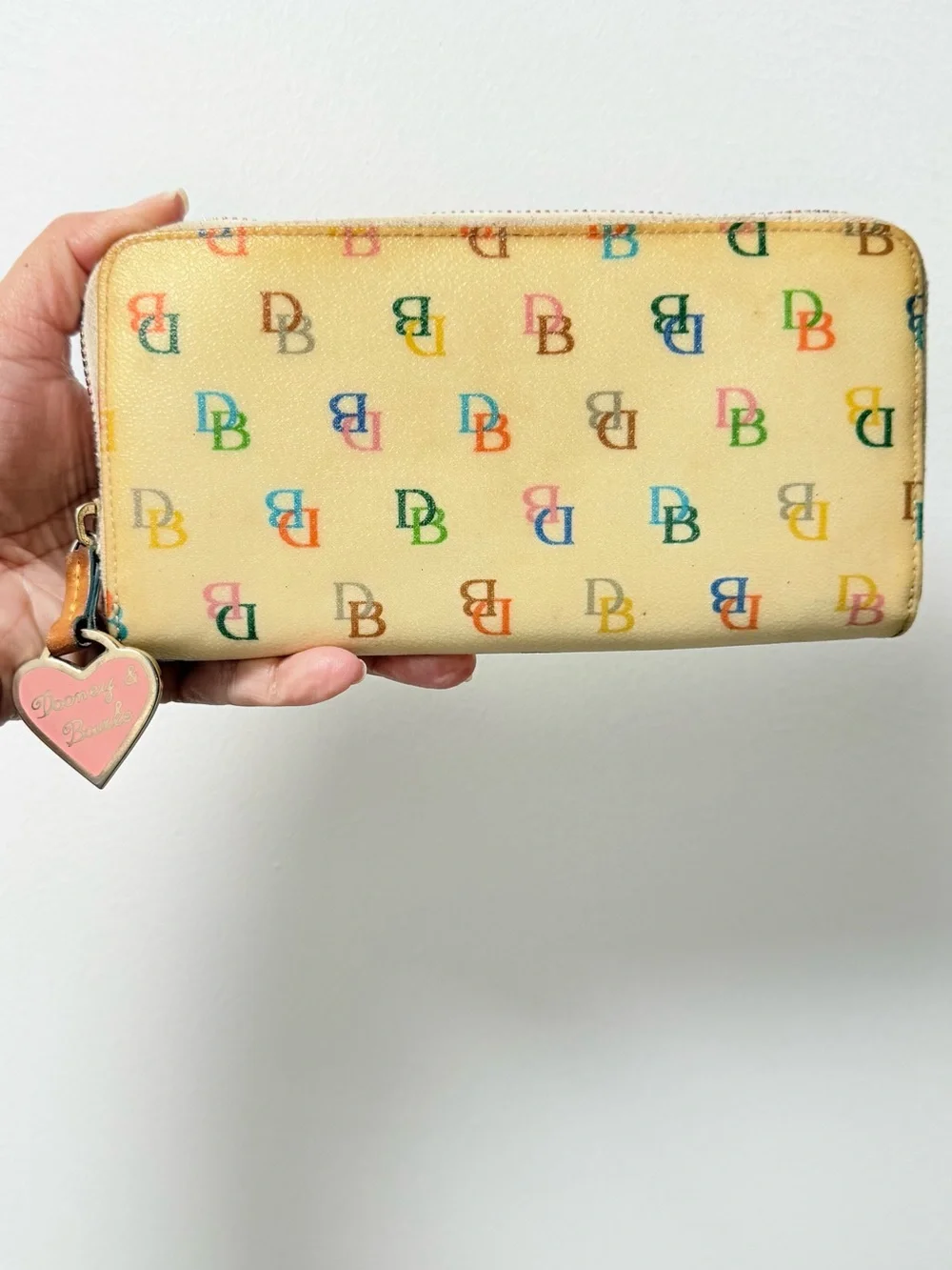 Dooney & Bourke Beige Zip-Around Wallet with Multicolor DB Print